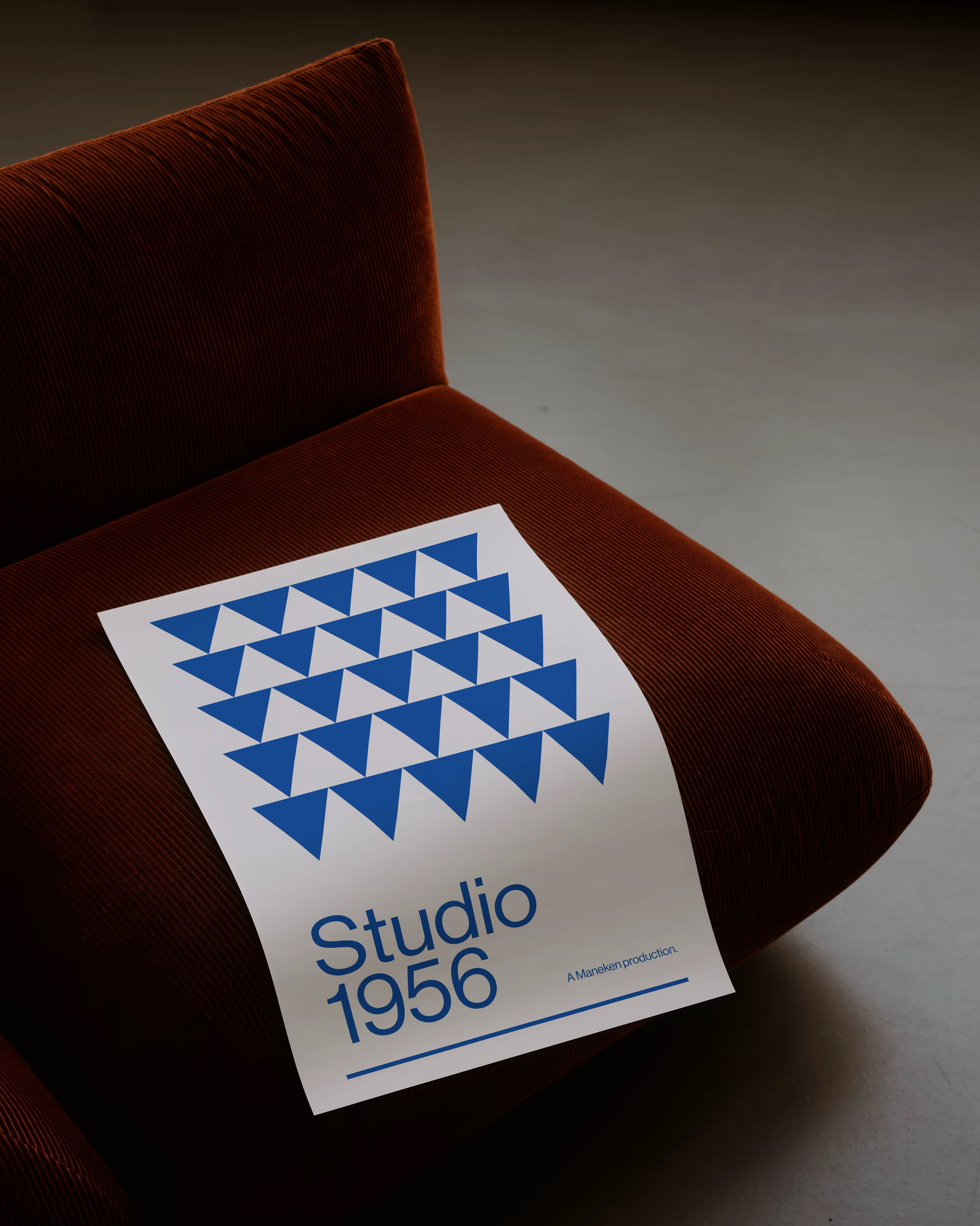 Poster displayed in atmospheric still life setting, shot by David Altrath.