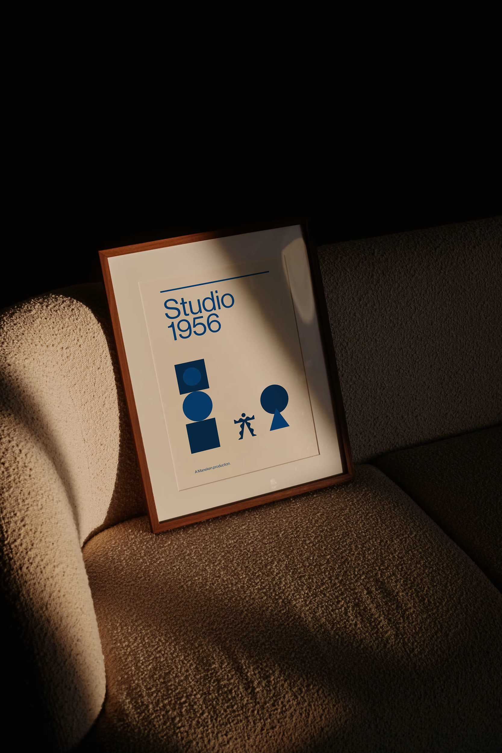 Close-up of paper texture and frame detail in MANEKEN mockup.