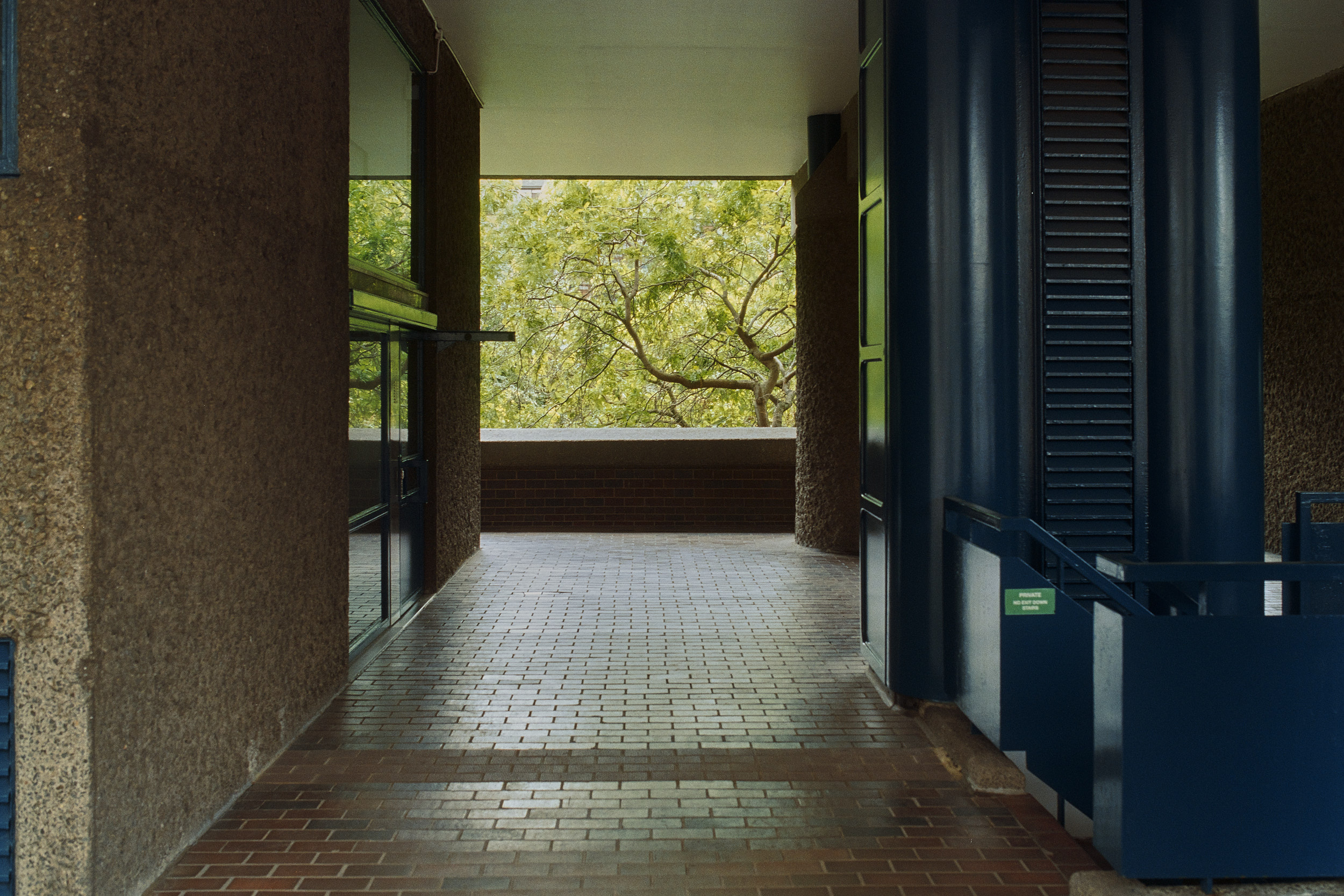 Brutalist lines and shadows at the Barbican photographed by David Altrath.