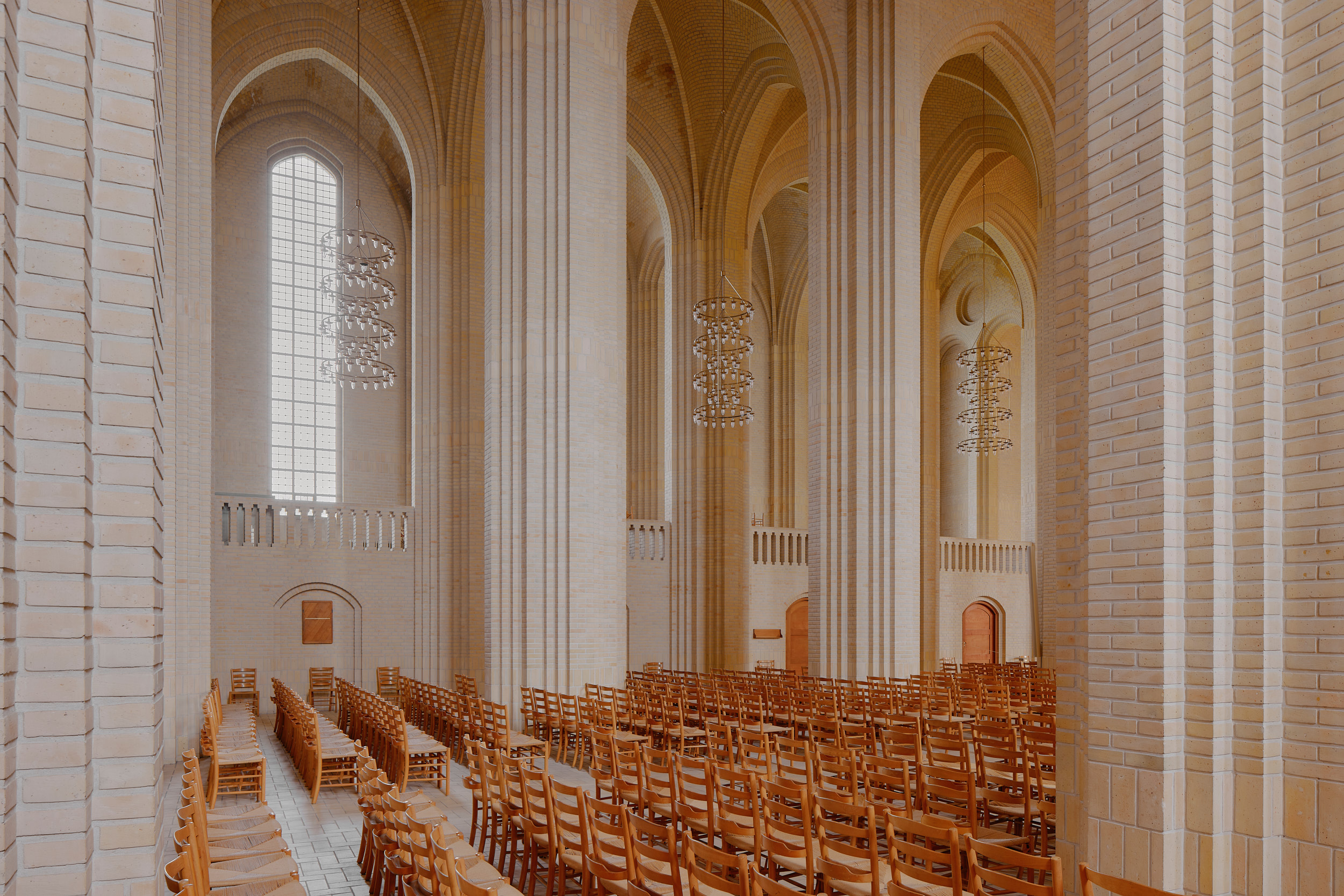 Architectural photograph exploring light and material inside Grundtvig’s Church by David Altrath