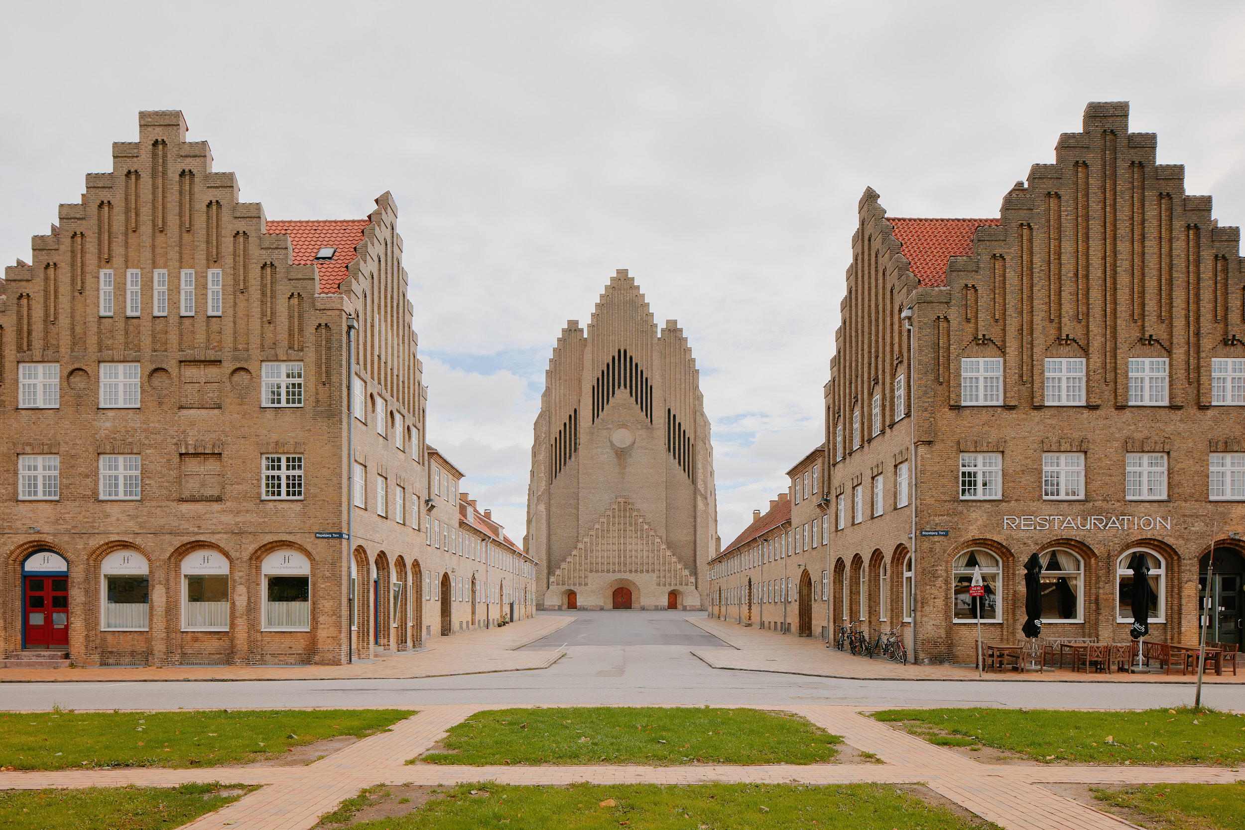 Architectural perspective highlighting scale and symmetry inside Grundtvig’s Church