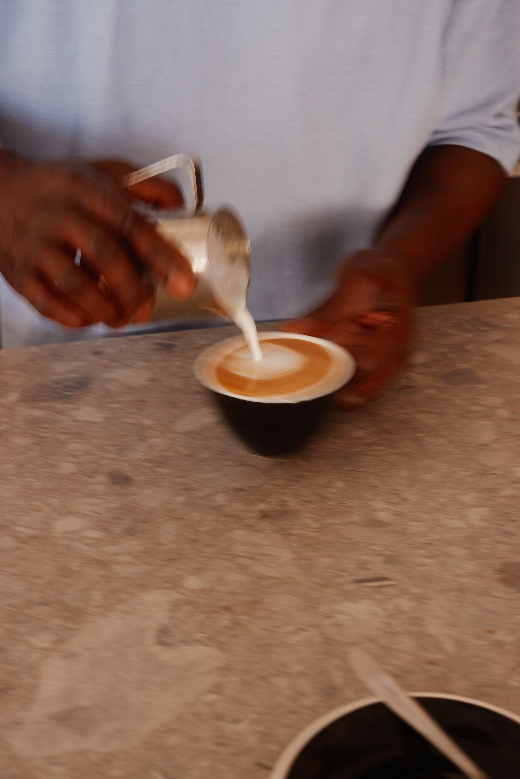 Café photography focused on light, shadow, and spatial balance