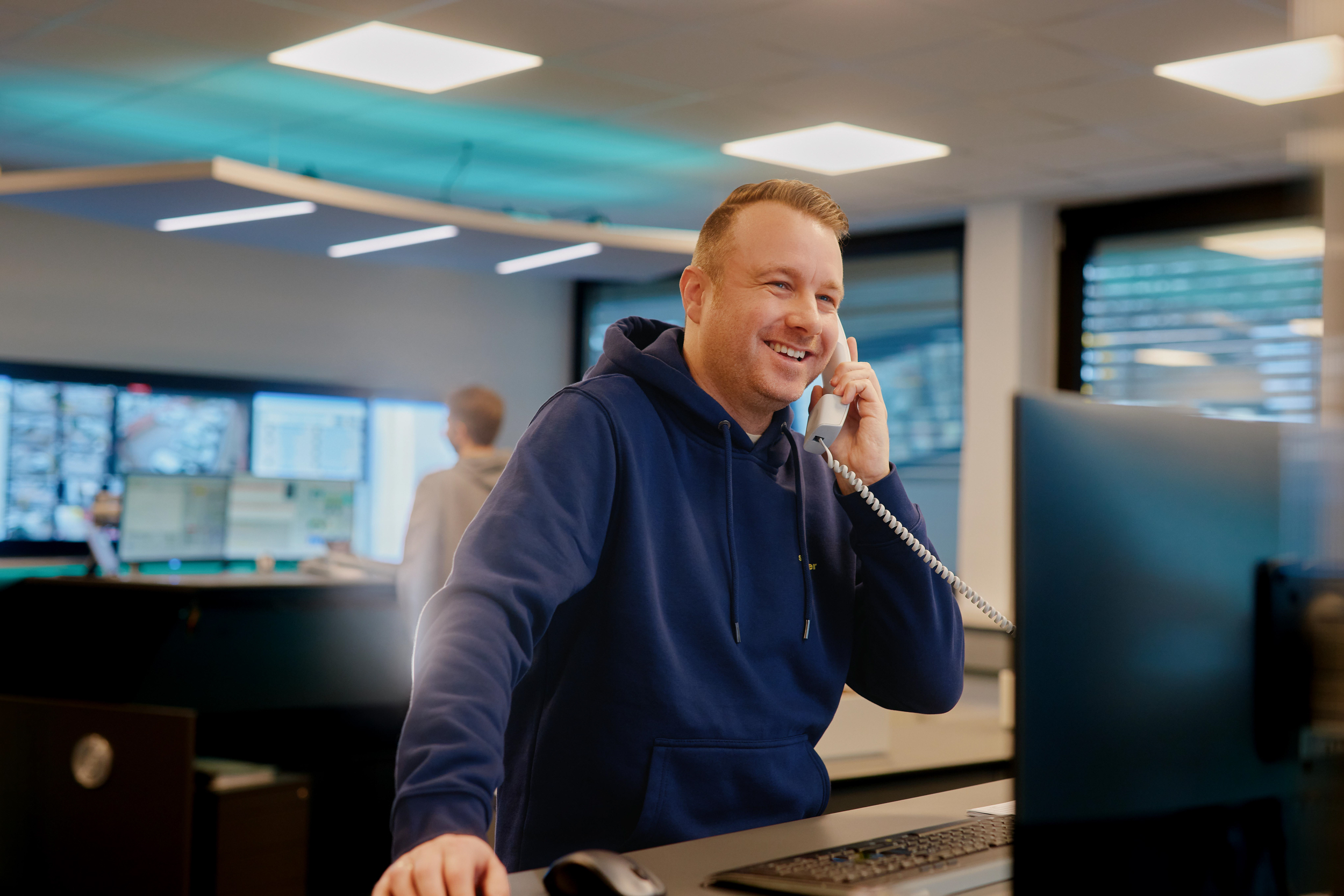 Industrial brand photography with real employees and strong visual identity