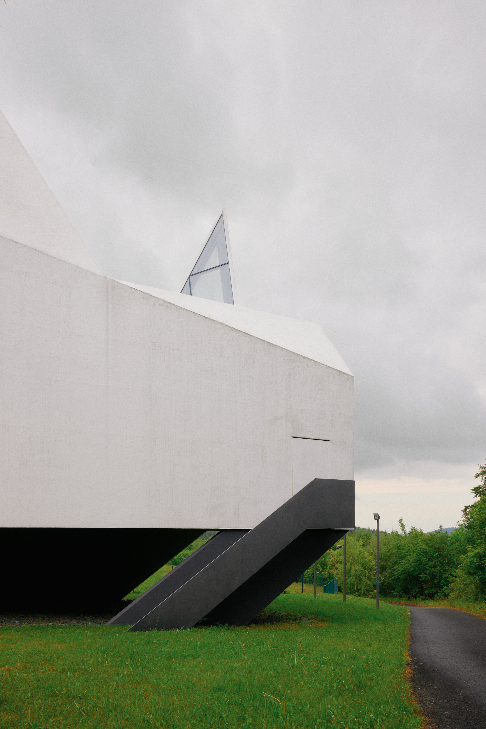 Autobahnkirche Siegerland exterior photographed by David Altrath, architectural photographer from Hamburg, with focus on form, facade and silhouette.