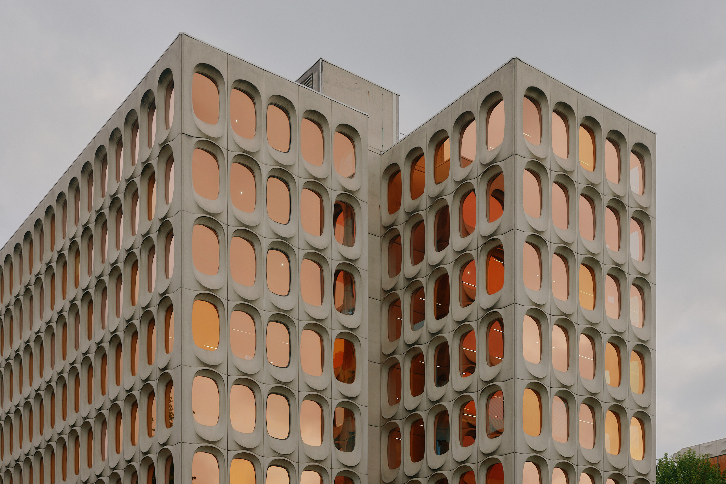 CBR Building in Brussels with sculptural white concrete façade by Constantin Brodzki
